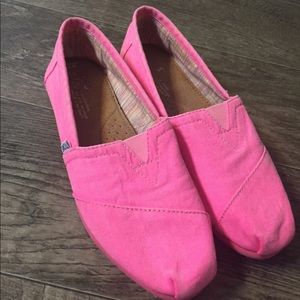 Bright pink TOMS